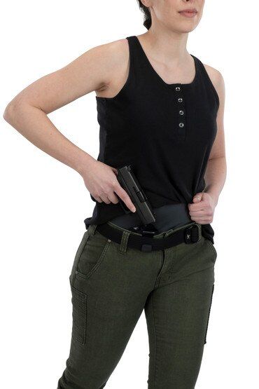 Vertx concealed carry guardian tank top in black from front with pistol